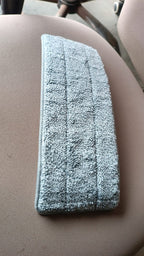 Packaged reusable microfiber mop pad replacement designed for household cleaning