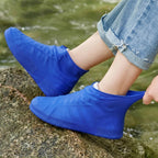 White background showing large silicone waterproof shoe cover ready to wear