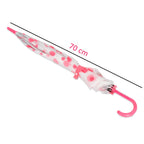A closed white umbrella with pink polka dots and a pink handle is shown with a 70 cm length measurement.