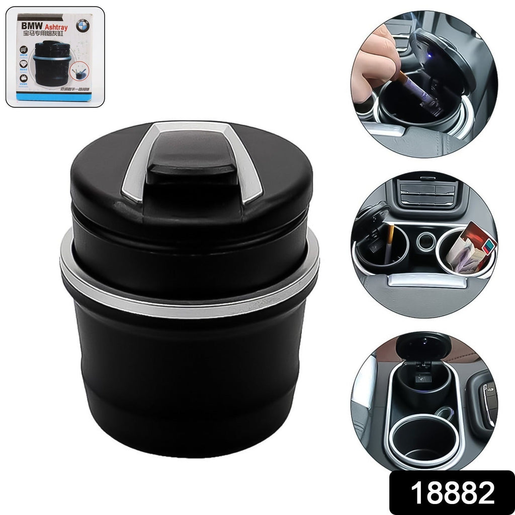 Car ashtray showing lid open for ash disposal