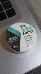 An individual using Pillowva disposable travel socks for a clean foot experience.