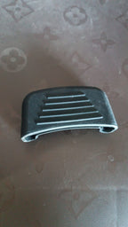 Close-up of silicone pot handle cover showing ribbed, non-slip texture