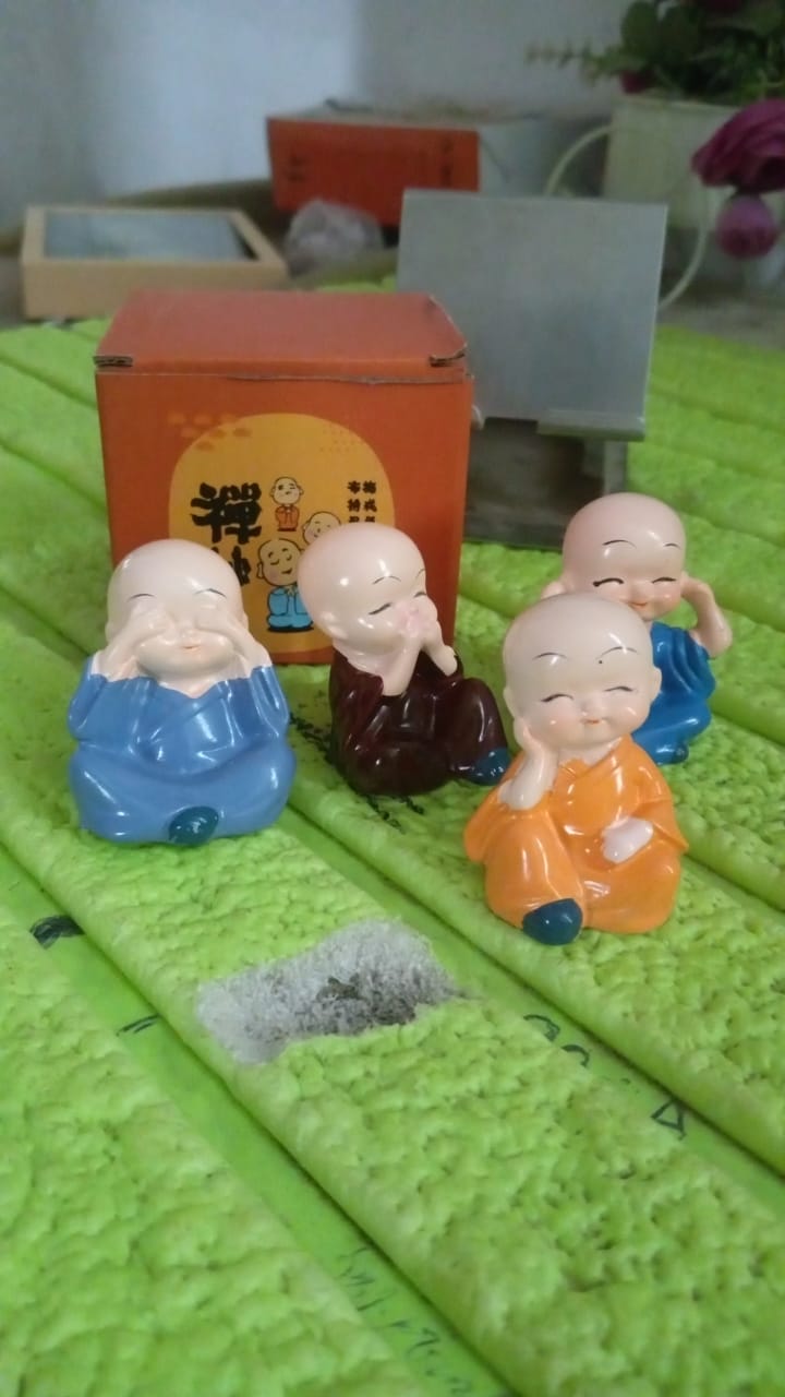 Packaging of the Baby Buddha showpiece set, ensuring safe delivery.