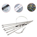 Heavy-duty stainless steel cable tie used for securing solar panel wiring on a rooftop.