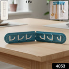 Foldable hook rack installed on kitchen wall holding utensils