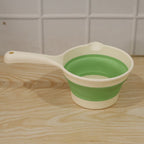 Foldable water dipper in action for home use