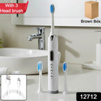Electric toothbrush with ergonomic handle and soft bristle brush head attached
