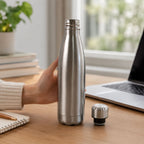 Durable stainless steel water bottle in silver, perfect for gym and school.