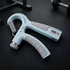 Angled view of hand gripper fitness tool