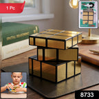 Side angle showing smooth rotation of golden Magic Puzzle Cube