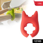 Heat-resistant plastic pot holder with cat ear design holding kitchen utensils securely