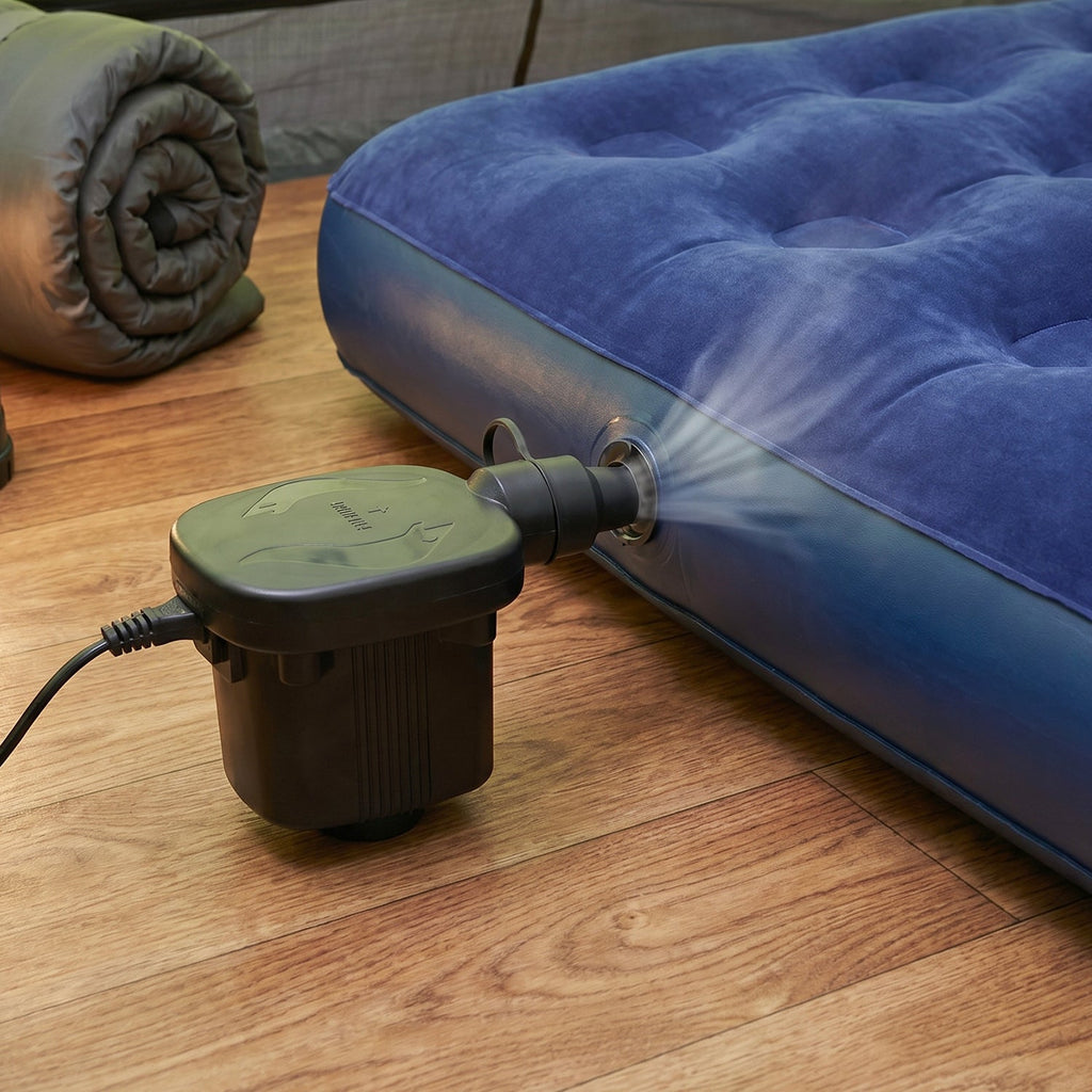 Electric air pump efficiently inflating a vibrant pool float for summer fun.