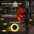 Ground-mounted solar lights along outdoor walkway