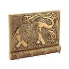 Detailed shot showcasing the antique gold elephant motif on the decorative key holder.