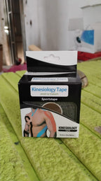 Close-up view of the breathable cotton texture and flexible stretch of Kinesiology Tape.