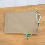 Close-up view of durable apron fabric and stitching