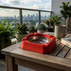 Durable ashtray showing cigarette rest grooves to reduce spills