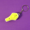 Mini LED keychain flashlight emitting blue UV light, showing portability