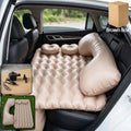 Inflated car air mattress set provides comfort in vehicle back seat.