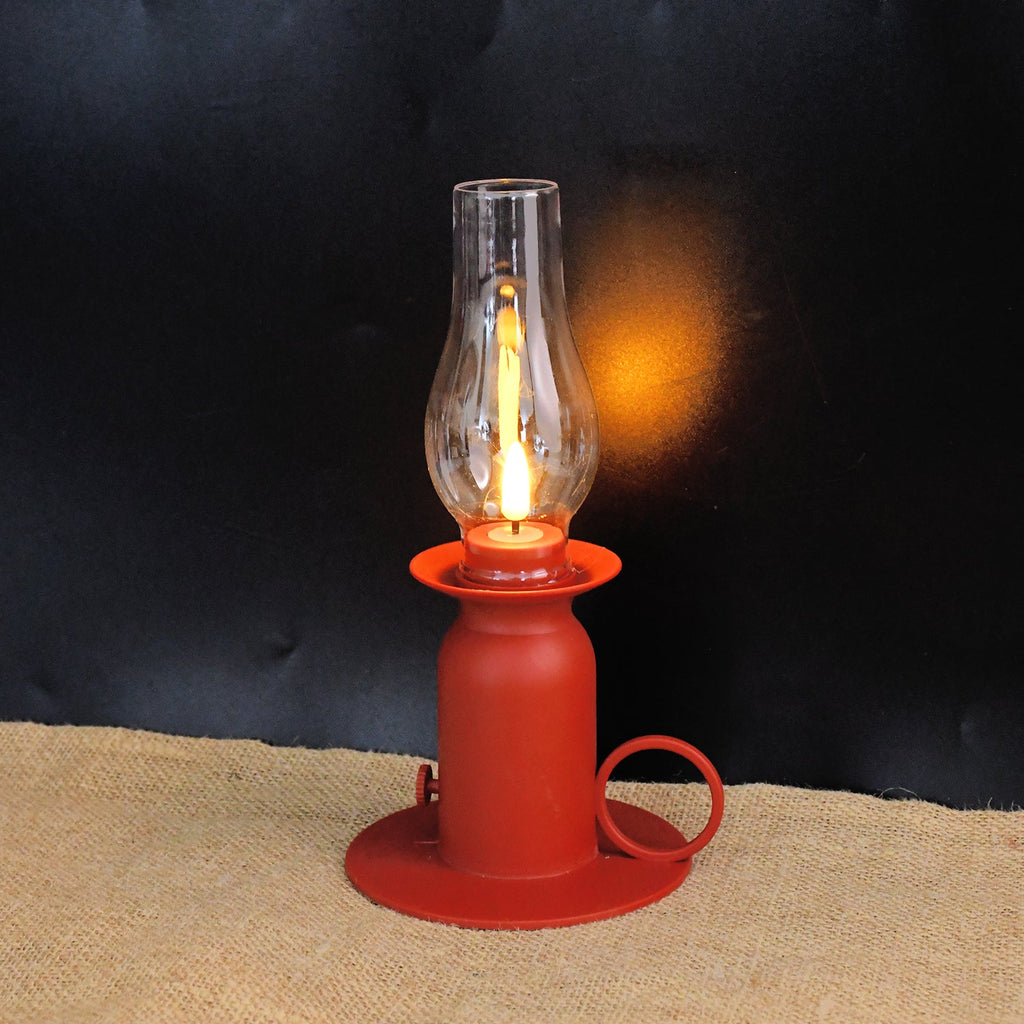 Warm flickering LED candle light in vintage style lamp