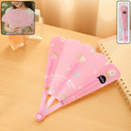 Foldable hand fan for women folded to fit inside a clutch
