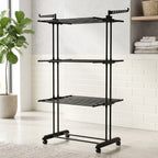 Foldable garment rack in a compact position for easy storage.