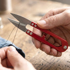 Handheld snip scissors ideal for sewing, crafting, and fabric trimming