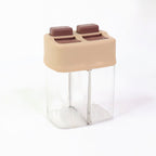 Transparent salt and pepper shaker set with dual lids for controlled pouring