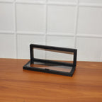 Back view of transparent floating jewelry display box showcasing sleek black ABS plastic frame