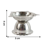 Spiritual pooja decoration featuring small sunflower steel diya stand