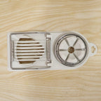 Stainless steel egg cutting tool for neat slices and wedges
