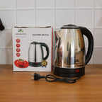 Lifestyle image of electric stainless steel kettle in home kitchen setting
