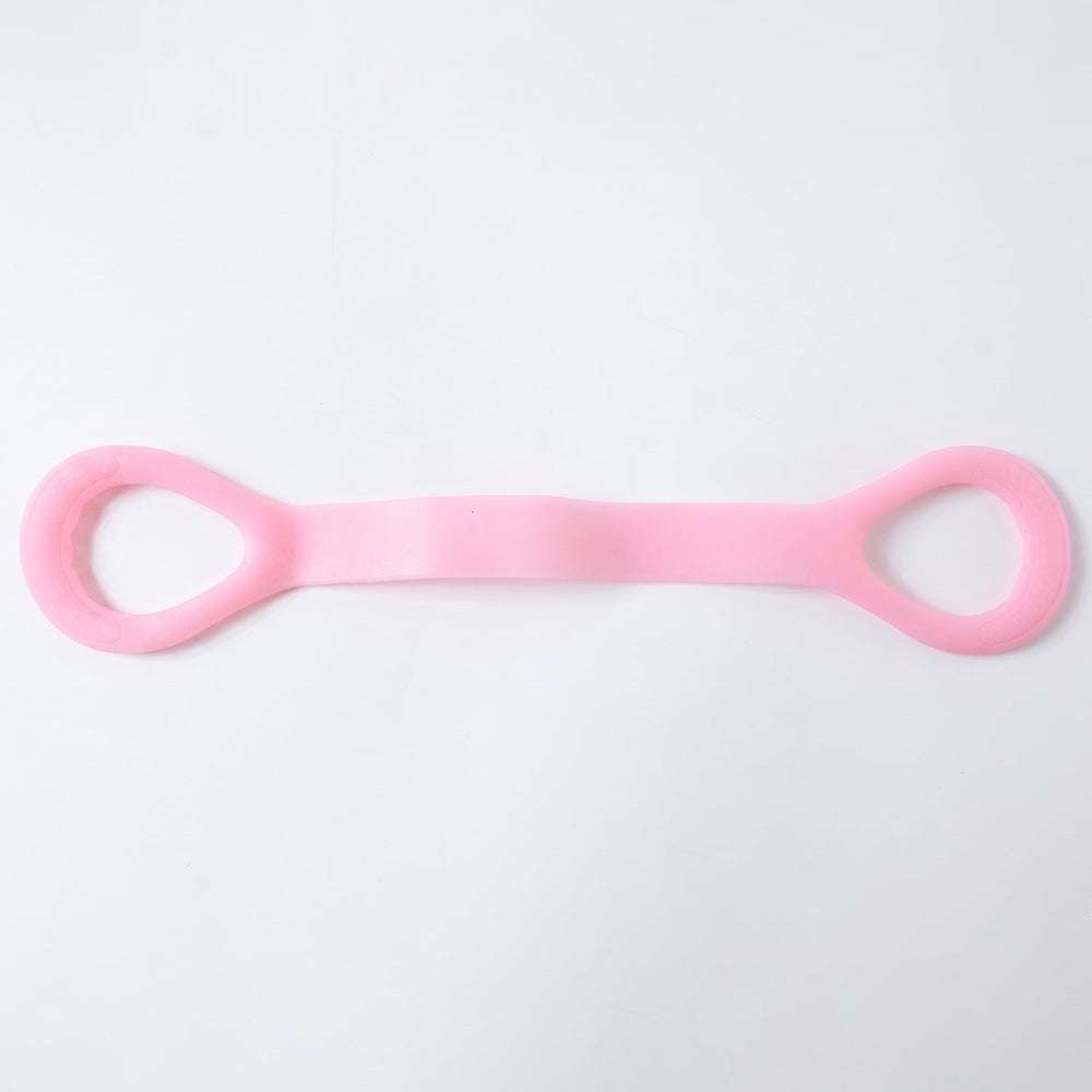 Woman using resistance band for arm exercises during workout
