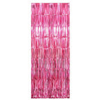 Foil fringe curtain used as an attractive metallic party backdrop for celebrations.