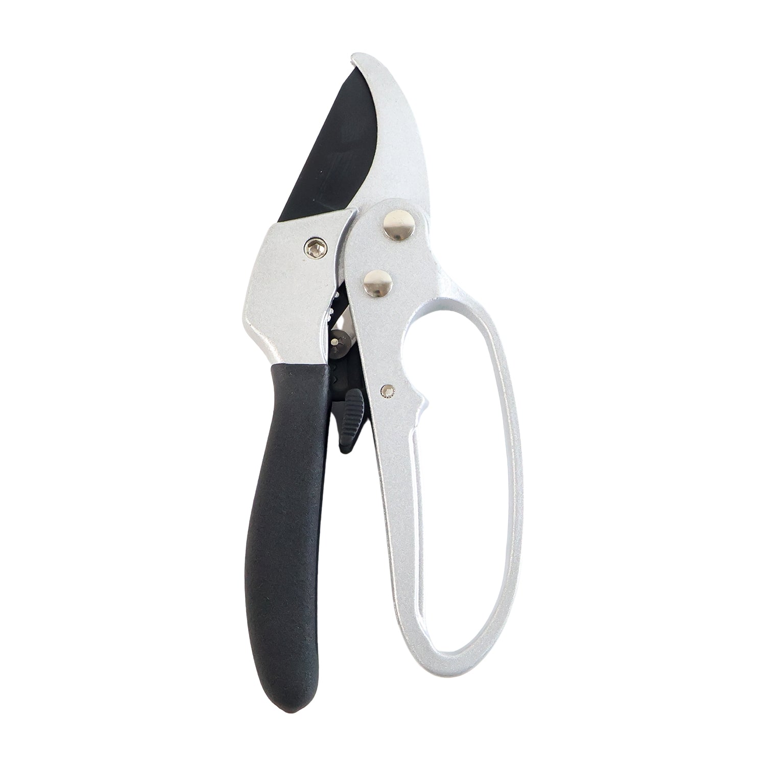 Gardening pruning shears actively cutting a small tree branch with precision.