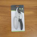 Indo Glow gardening pruning shears displayed next to fresh green foliage, ready for garden tasks.