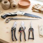 Gardening tools including pruning saw and shears for garden care
