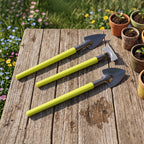 A person using the Mini Gardening Tool Set for planting a small seedling.