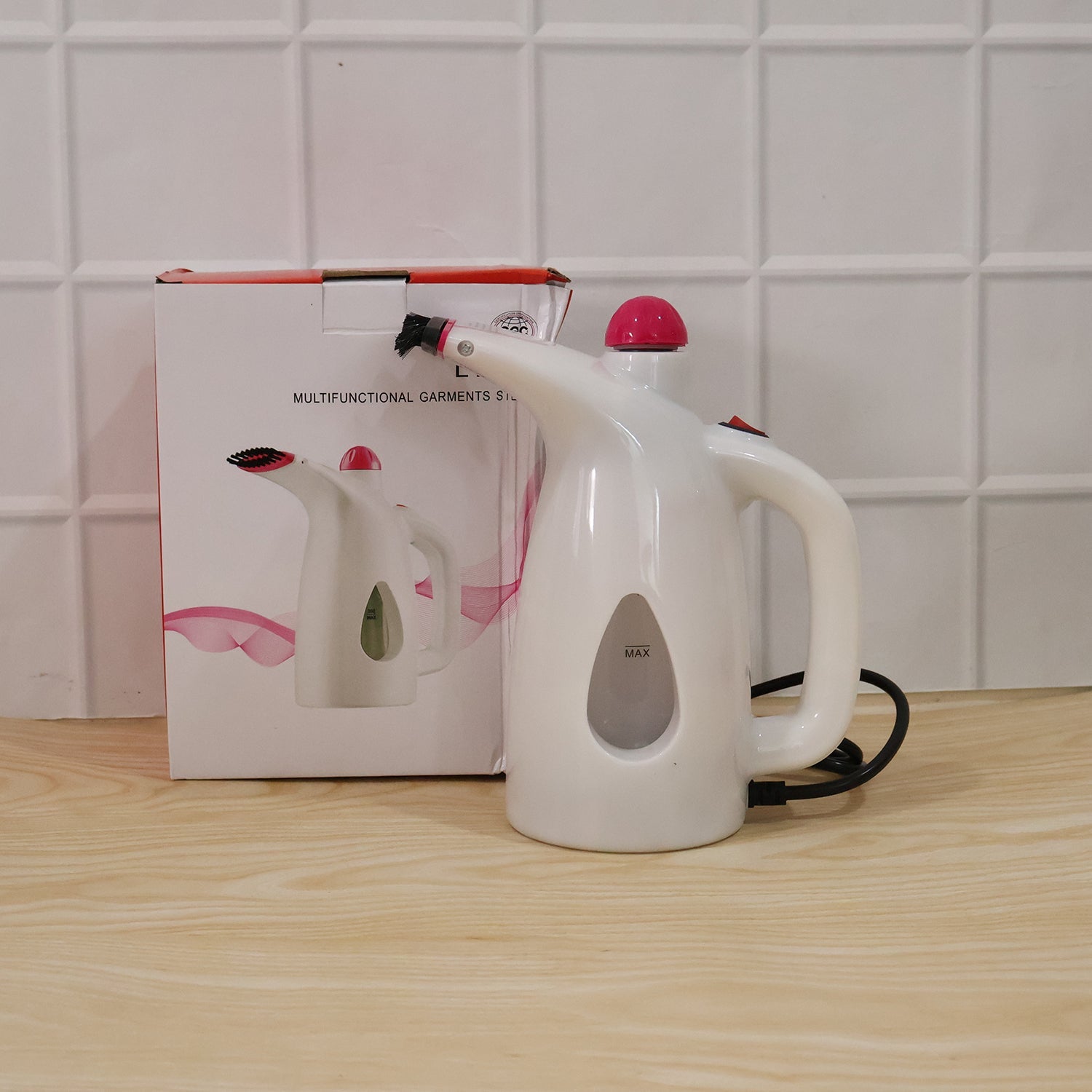Portable garment steamer perfect for travel and quick fabric refreshment