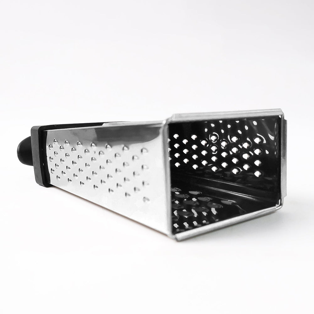 Fine and coarse grater surfaces of stainless steel 4-in-1 grater with handle