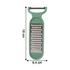 Multipurpose vegetable peeling and grating kitchen tool in use