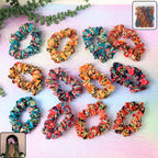 Set of 12 printed fabric hair scrunchies with various vibrant patterns