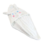 Hooded hair drying cap secured with button loop for easy use