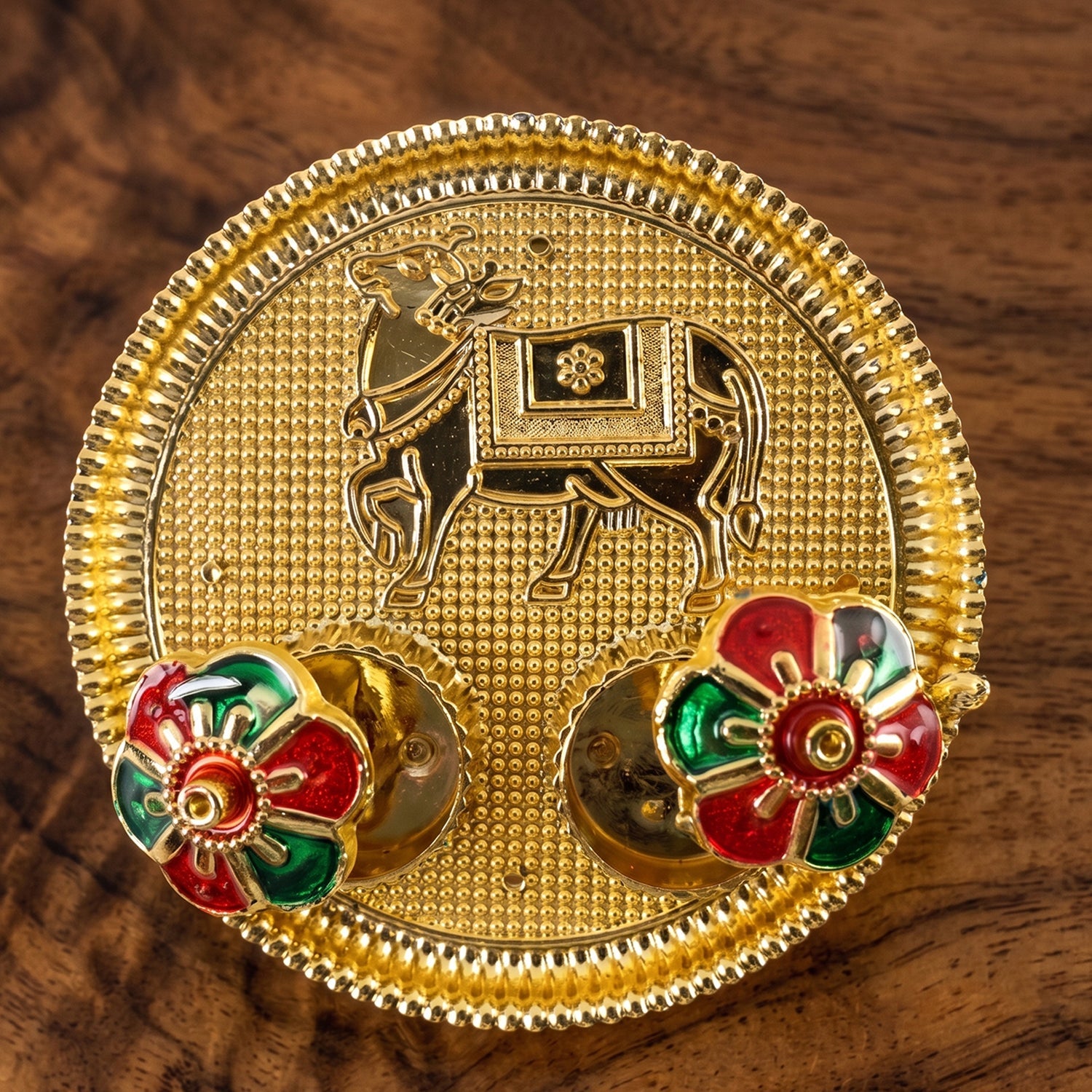 Ornate cow shaped kumkum holder for festivals and worship