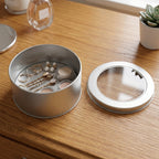 Round tin box lid detail