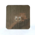Versatile self-adhesive wall hook on a clean white background.