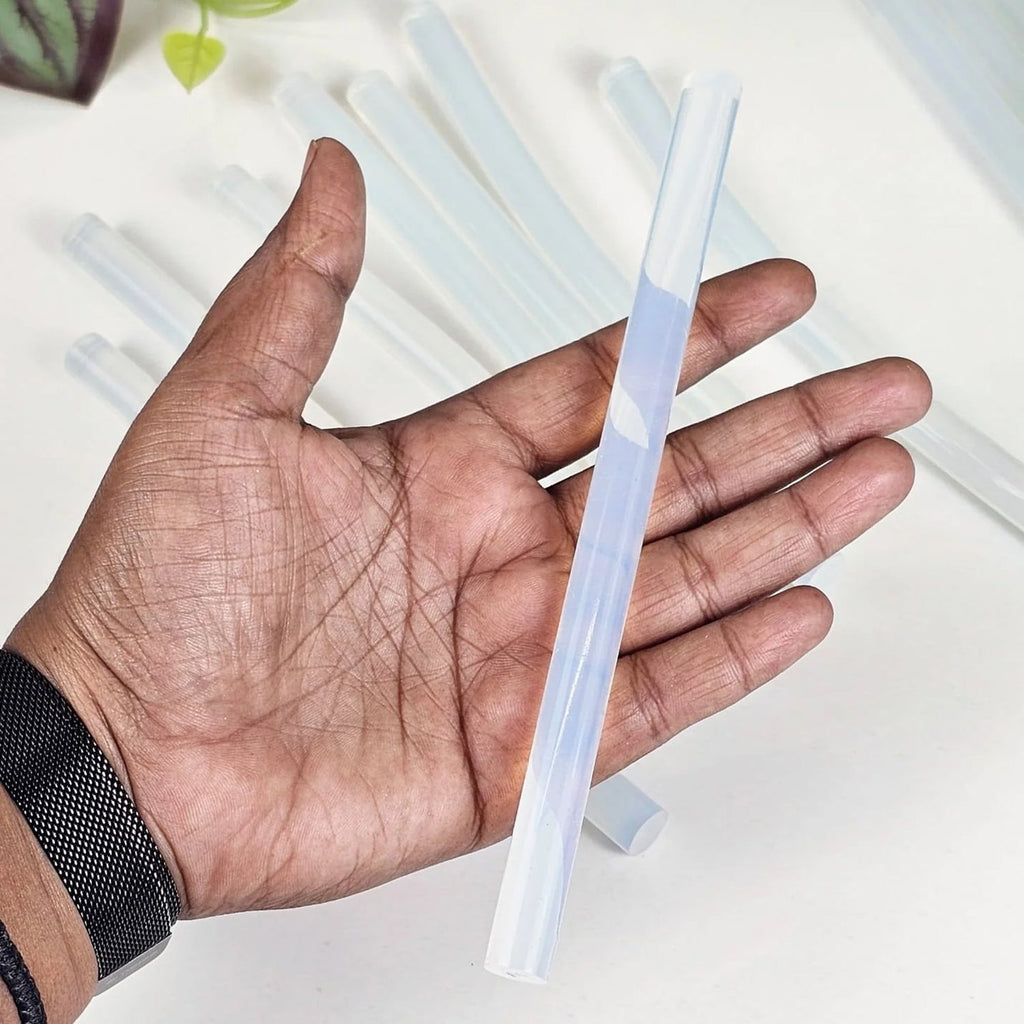 Transparent glue stick providing strong adhesion for various surfaces