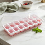 Stackable plastic ice cube trays with lids for convenience