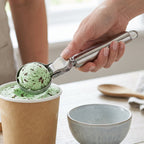 Kitchen stainless steel scooper with release lever for baking