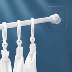 Plastic wall hook with strong hold on smooth surfaces